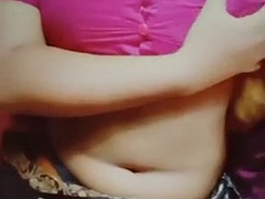 Hot and sexy teen girl from the village is showing off her beautiful boobs, body and pussy wearing a new saree, blouse and bra