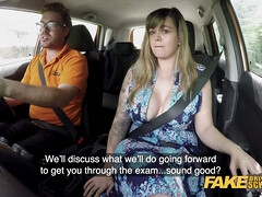 Watch this British babe with massive boobs get her driving skills tested in a wild public car test