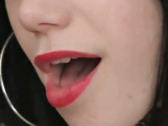 brunette in fishnet outfit orgasms riding a sybian