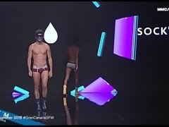 MODA BANO. Handsome guys showing new models of men's swimwear