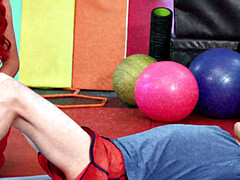 Redhead cougar sucks shaft before plowed by guy in gym