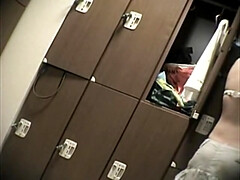 Girls of the oriental origin strip in changing room 436 su0301