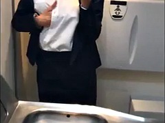 Latina flight attendant joins the mile high masturbation club in the restroom