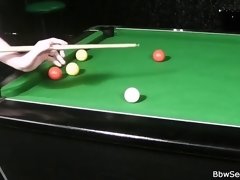 BBW cheating in a fishing net on the pool table