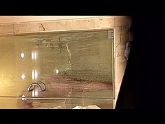 Sexy Christi voyeured in hotel shower