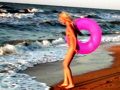 Hot naked blonde on the beach