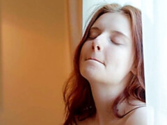 Sweet redhead chick Sienna is having fun with her hungry wet snatch