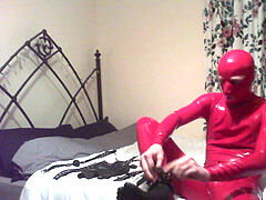 Self-Hogtie in crimson spandex Rubber Catsuit